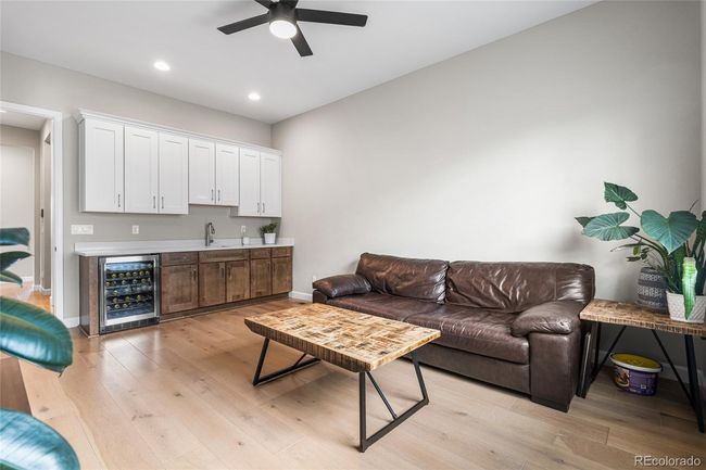 In-law suite private living area with wet bar perfect for guests or multigenerational living | Image 25