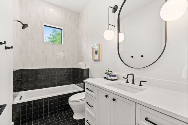 Full bath that serves secondary bedroom #2 and the living area. | Image 24