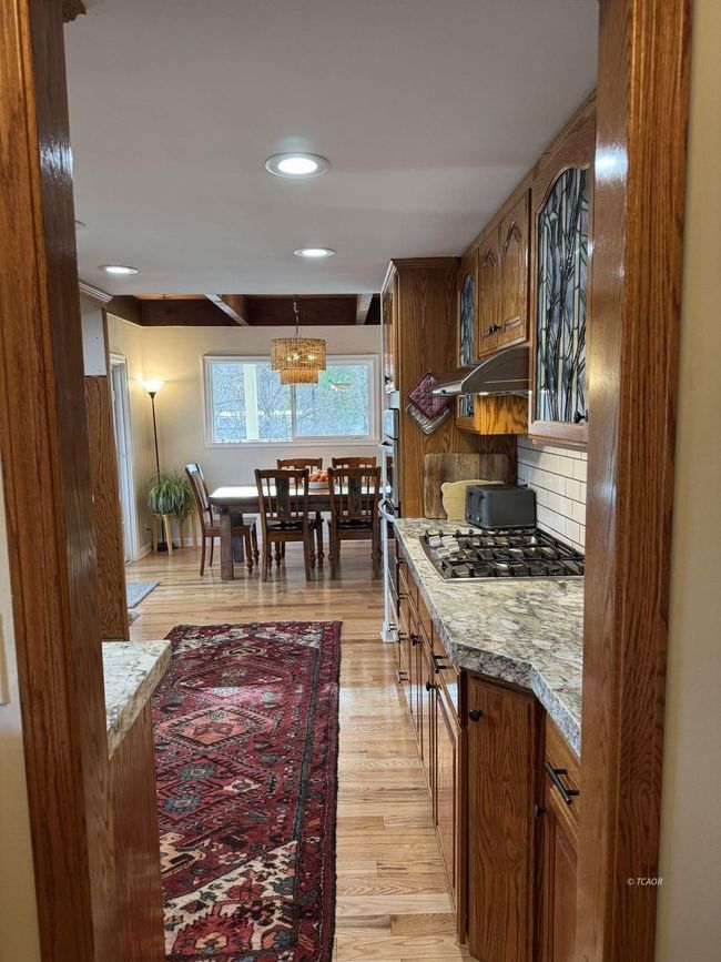 kitchen looking at dining room | Image 19