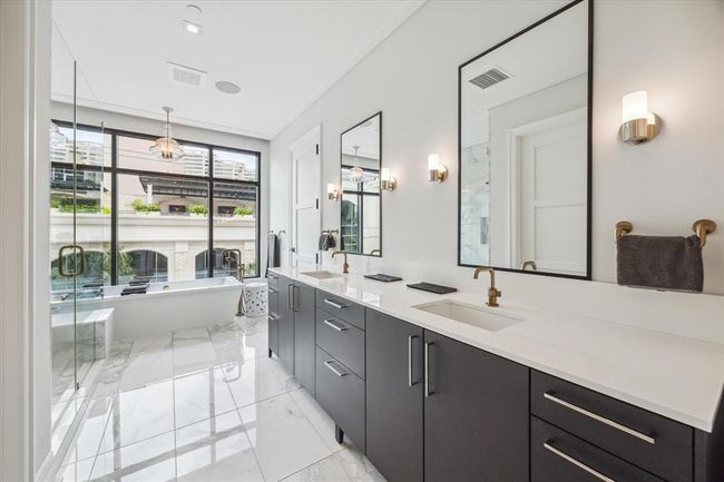 [Primary Bath] alternate view featuring plentiful cabinet and drawer space | Image 27
