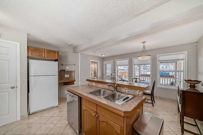 163 Eversyde Circle Sw, Home with 4 bedrooms, 2 bathrooms and 2 parking in Calgary AB | Image 10