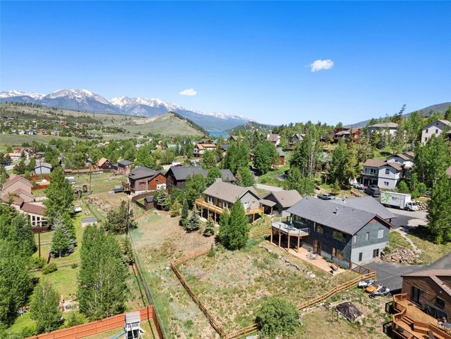 Aerial view of residential area featuring mountains | Image 21