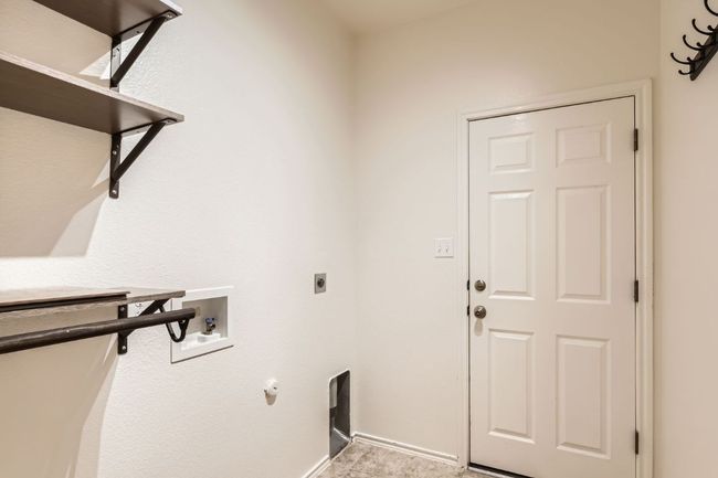 Laundry area with washer hookup and hookup for an electric dryer | Image 27