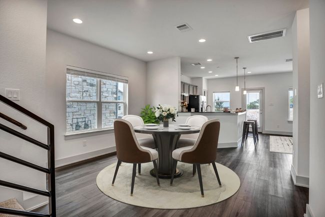Dining area off the kitchen with open concept floorplan | Image 4