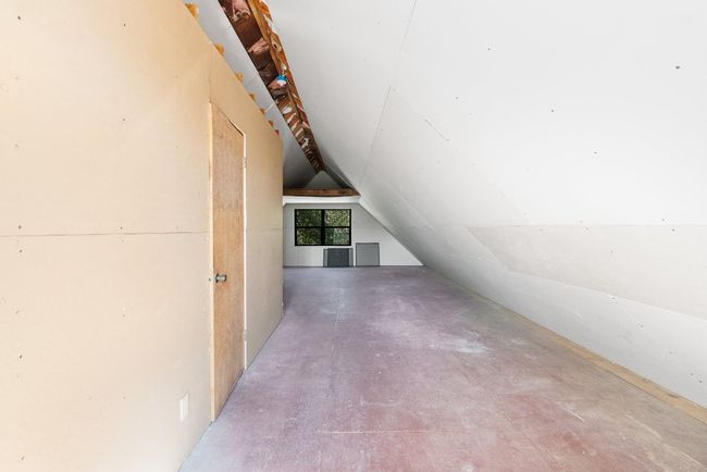 Additional living space featuring lofted ceiling | Image 31