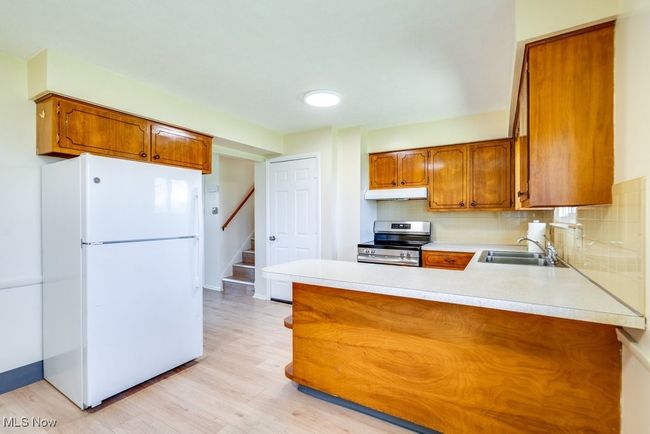 1795 Hudacsek Dr, Home with 4 bedrooms, 2 bathrooms and null parking in Mogadore OH | Image 6