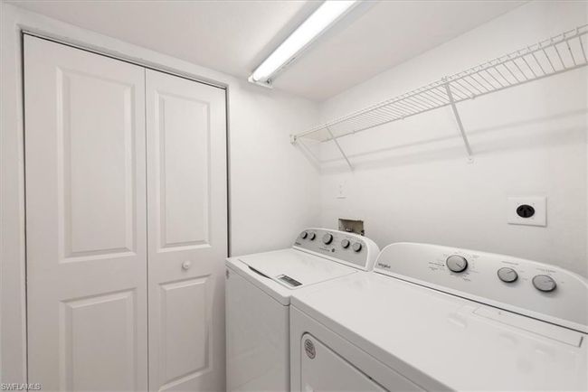 Laundry room featuring separate washer and dryer | Image 23