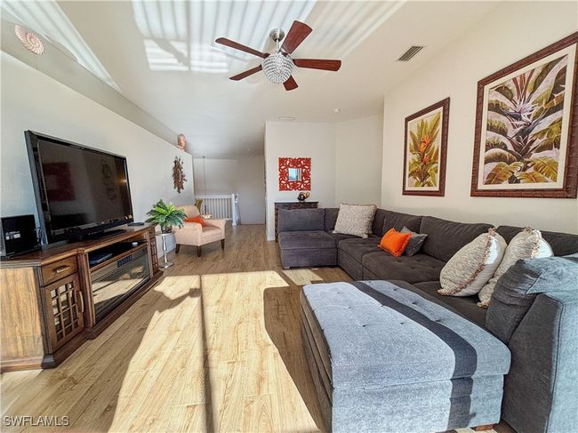 Sunlit spaces and 9 foot ceiling heights make for a bright and spacious home. | Image 6
