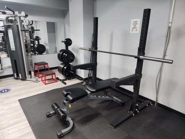 Workout room with wood finished floors and baseboards | Image 10