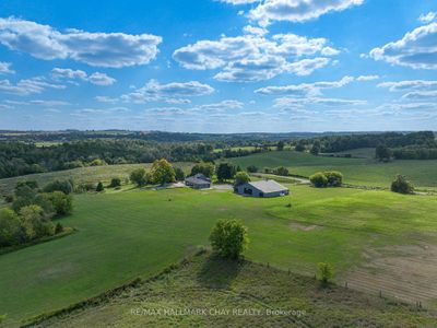 956249 7 Th Line E, Home with 3 bedrooms, 3 bathrooms and 12 parking in Mulmur ON | Image 1