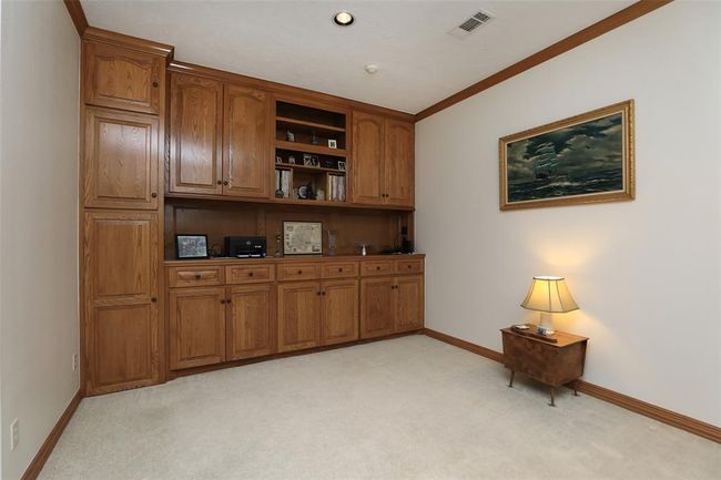 Complete with stained hardwood trim and built-in storage. | Image 16
