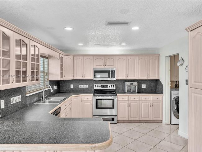 8970 Johnson St, House other with 3 bedrooms, 2 bathrooms and null parking in Pembroke Pines FL | Image 25