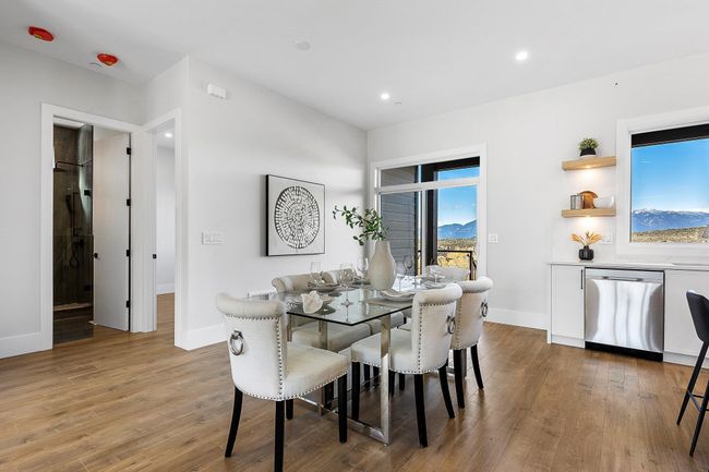 Dining room with baseboards, wood finished floors, and recessed lighting | Image 8