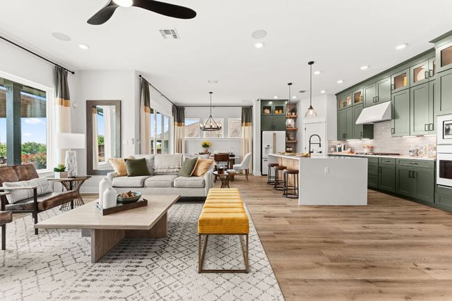 Tall ceilings enhance the sense of openness and add a touch of elegance to the main living area. | Image 4