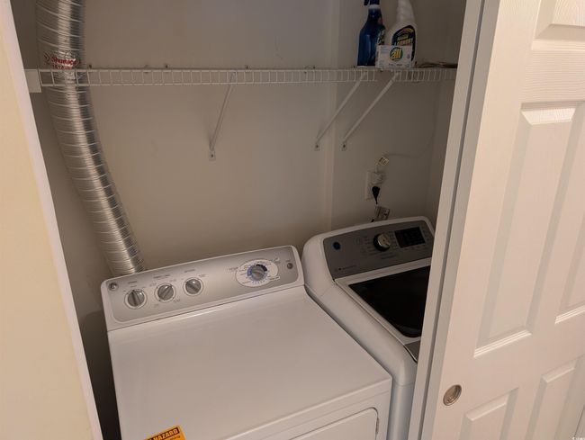 Laundry area with laundry area and separate washer and dryer | Image 9