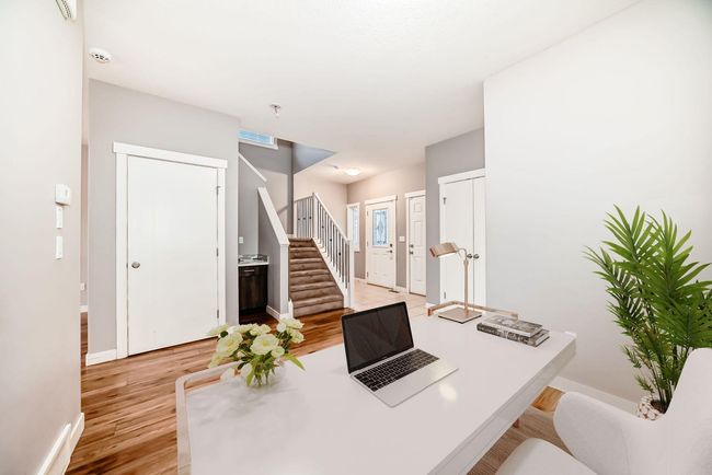 23 Baysprings Way Sw, Home with 3 bedrooms, 3 bathrooms and 1 parking in Airdrie AB | Image 4