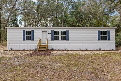 7510 Nw 167 Th Place, House other with 3 bedrooms, 2 bathrooms and null parking in Trenton FL | Image 1