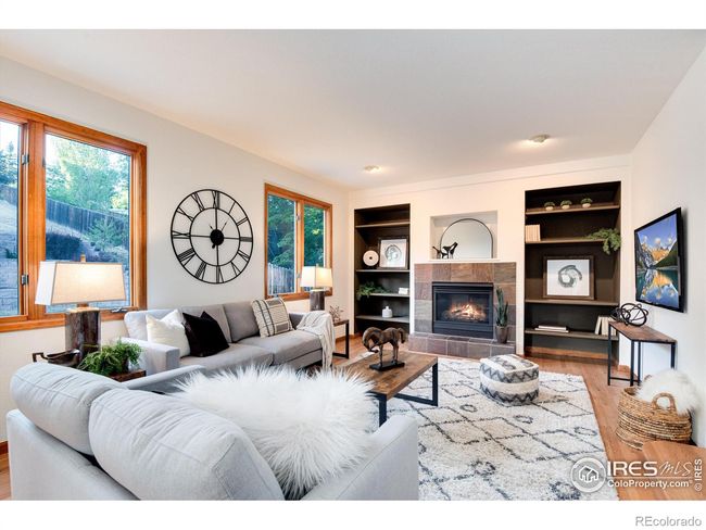 Family room with cozy fireplace | Image 19