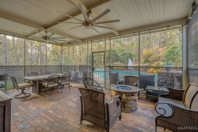 Screened brick floored back porch | Image 57