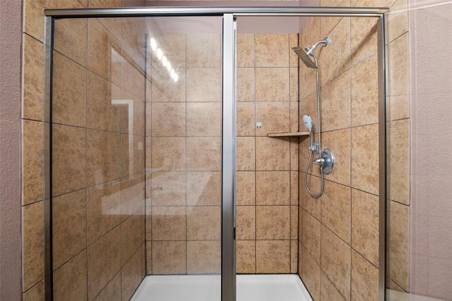 Full bath featuring a stall shower | Image 6