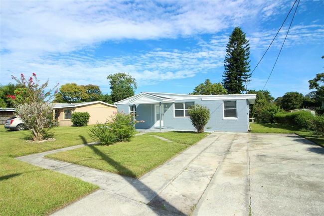 Large lot, ample driveway. | Image 5