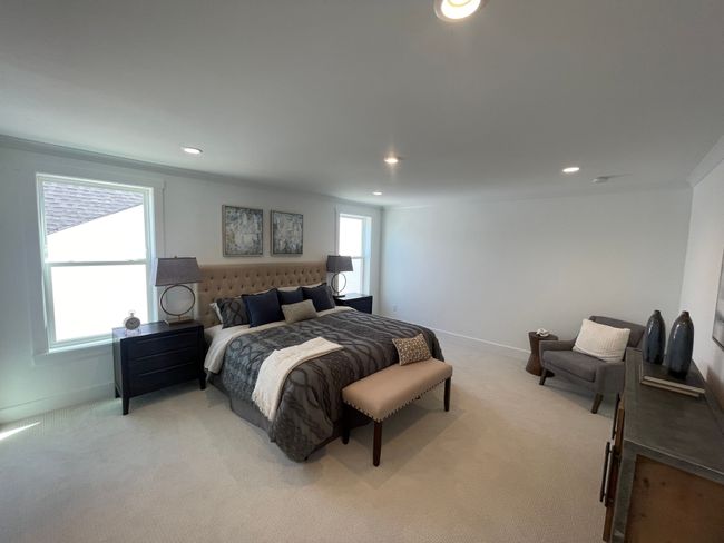 Luxurious primary bedroom suite | Image 13