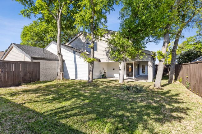Back of house featuring a yard and a fenced backyard | Image 29