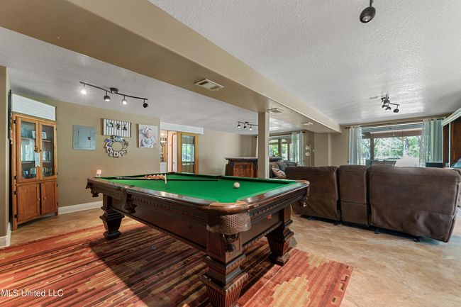 INFORMAL LIVING/GAMEROOM | Image 23