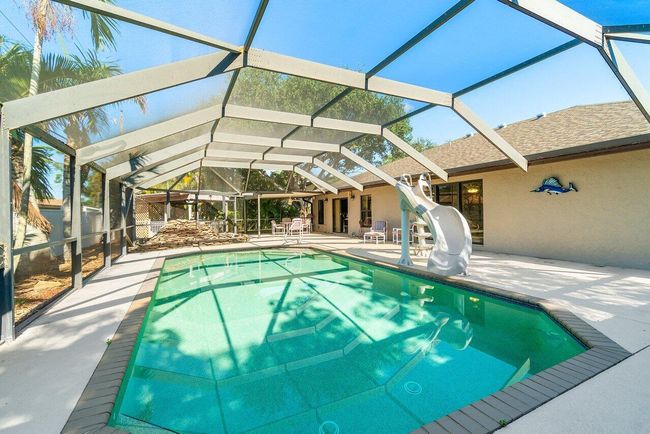 61 W Rubber Tree Dr, House other with 3 bedrooms, 2 bathrooms and null parking in Lake Worth FL | Image 24