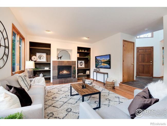 Family room with cozy fireplace | Image 20