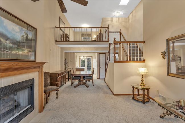Open Living / Dining Room with Ample Space to Add a Leaf or Two to the Dining Room Table for the Holidays. | Image 9