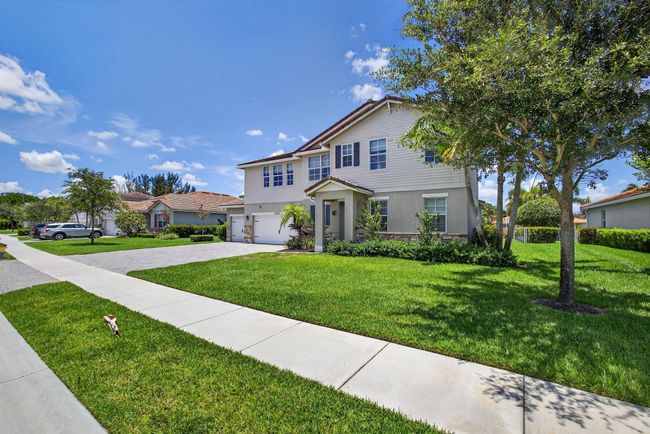 12041 Cypress Key Way, House other with 5 bedrooms, 3 bathrooms and null parking in Royal Palm Beach FL | Image 46