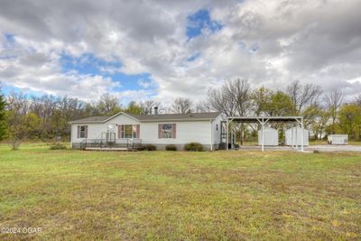 13037 County Road 160, House other with 4 bedrooms, 2 bathrooms and null parking in Carthage MO | Image 1