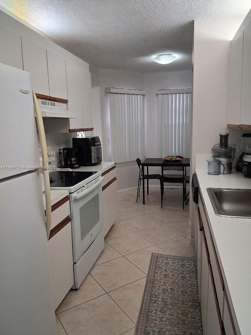 apt-207u-1100 Sw 128th Ter, PEMBROKE PINES, FL, 33027-1969 | Card Image