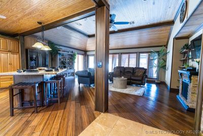 Entry way to open concept kitchen and living. | Image 3