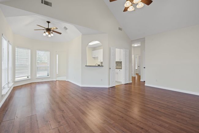 Living area is open to dining. | Image 9