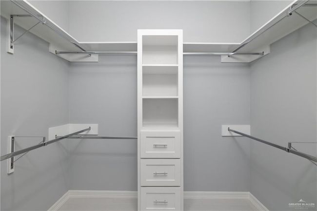 View of walk in closet | Image 8