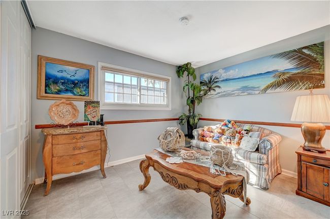Sitting room featuring baseboards | Image 28