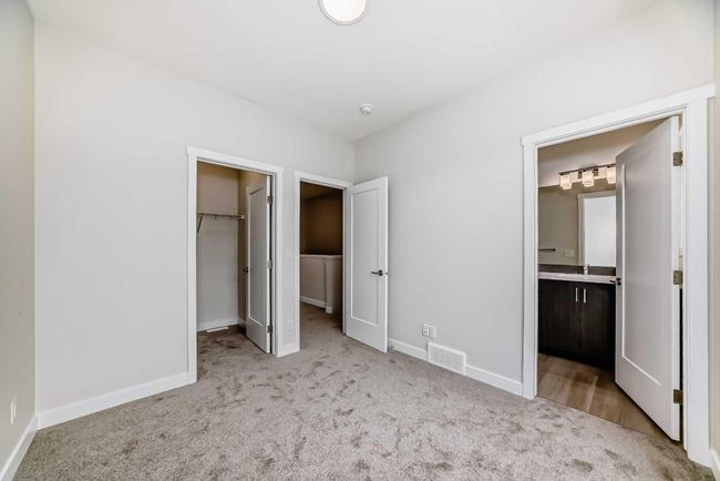 214 Shawnee Square Sw, Townhouse with 2 bedrooms, 3 bathrooms and 3 parking in Calgary AB | Image 26