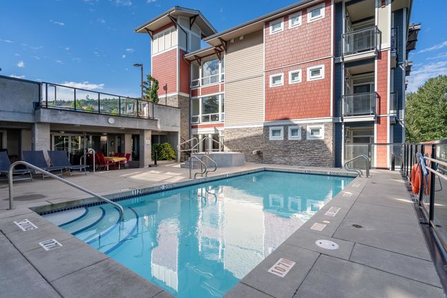 Community pool featuring a patio area | Image 11