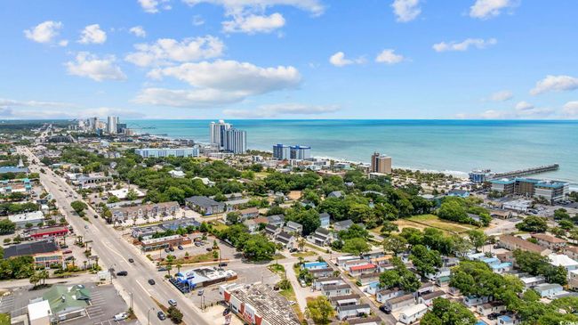 View of urban area with a large body of water | Image 4