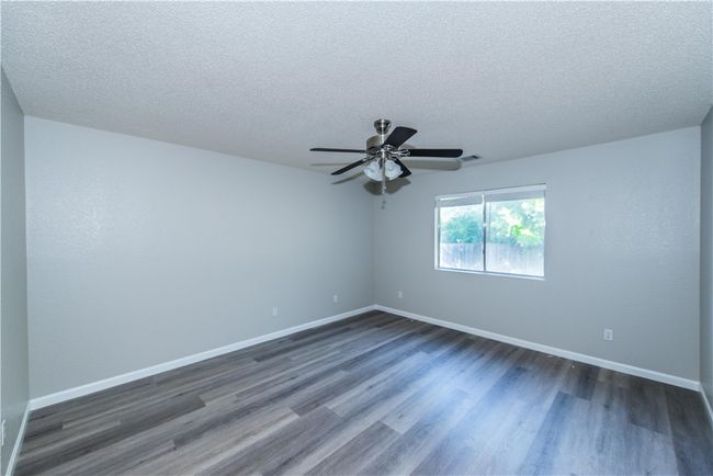 Primary bedroom facing rear of property | Image 13