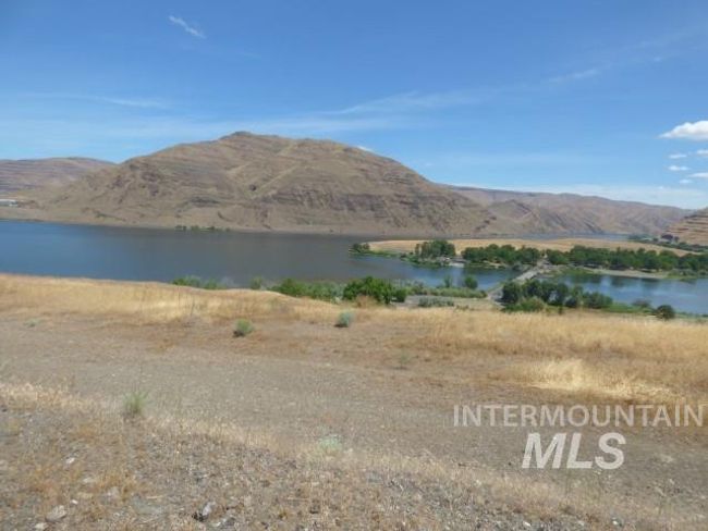 Water view featuring a mountainous background | Image 26