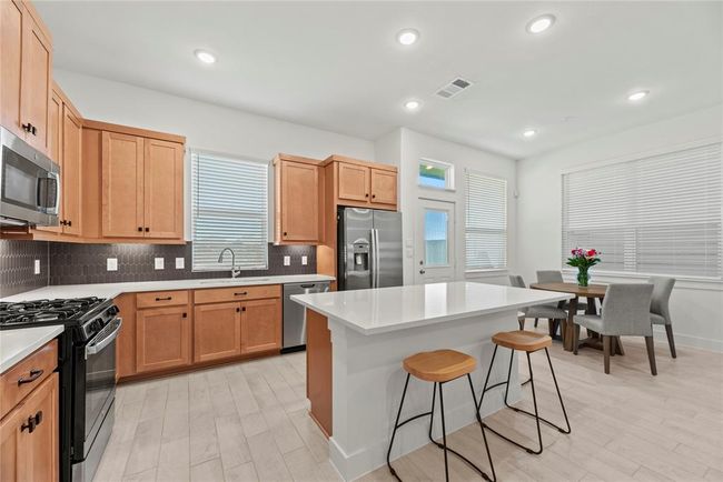 Fabulous island kitchen and breakfast area. | Image 9