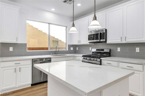7353 Arlington Garden St, Las Vegas, NV, 89166-6520 | Card Image