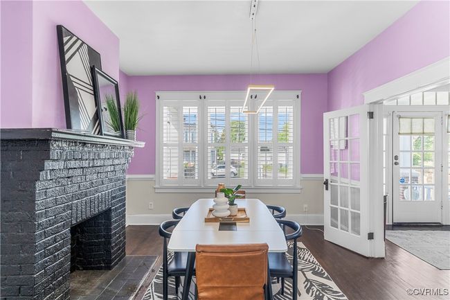 Dining space featuring plenty of natural light, baseboards, and dark wood-style flooring | Image 8