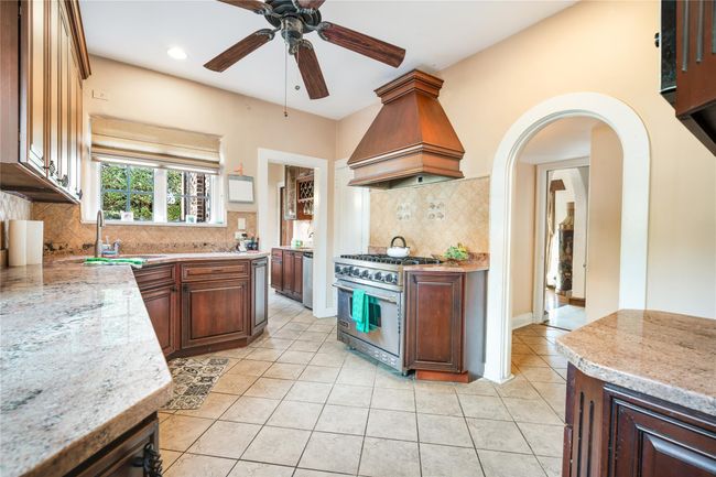 Another angle of the kitchen showing both entrances to the kitchen. | Image 9