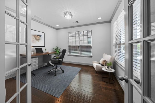 Office space featuring hardwood / wood-style floors, visible vents, and crown molding | Image 4