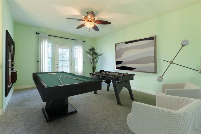 Virtual staged View before the home was painted. Game room featuring billiards table, carpet flooring, baseboards, and ceiling fan | Image 23