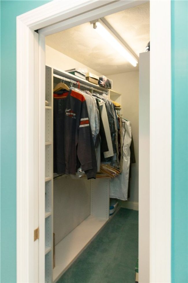 Walk In Closet in the first Floor Master Suite | Image 19